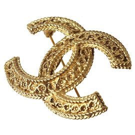 Spilla Chanel Coco Mark 1108 in oro D'oro