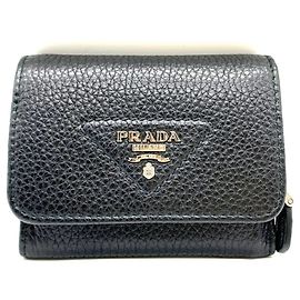Portefeuille compact en cuir triangle pliable Prada Noir