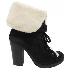 Stivali in shearling Prada Nero Bianco