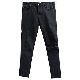 Jeans slim com desgaste de cintura média em algodão preto Alexander Mcqueen Preto