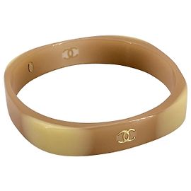 Chanel Pulseira de bangles de resina bege vintage com logo CC Bege
