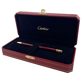 Bolígrafo Cartier Santos Roja Dorado