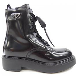 Botas de couro escovado Prada Preto