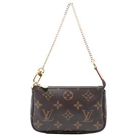Mini Pochette Accessoires Monogram Marrone Louis Vuitton Marrone