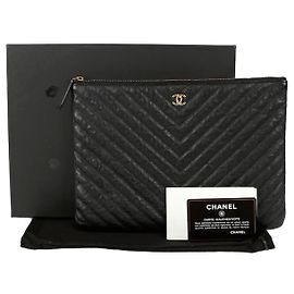 Chanel Caviar Classic New Medium Clutch Black