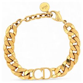 BRACELET CHRISTIAN DIOR GOURMETTE CD DANSEUSE ETOILE DORE + POCHON BANGLE Doré