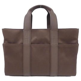 Bolsa Hermès Acapulco MM em tecido Chevron Marrom