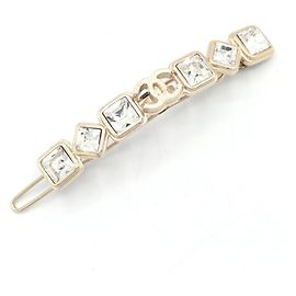 Clip para el cabello de strass dorado Chanel Dorado