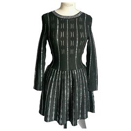THE KOOPLES Robe neuve noire pastilles argent T1 Noir