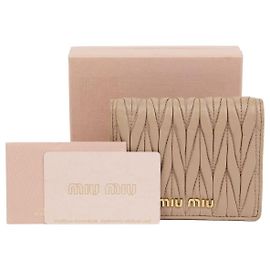 Cartera Miu Miu 5MV204 con logo acolchado beige Castaño