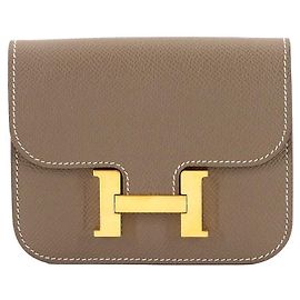 Billetera bifold slim Hermès Constance Gris pardo