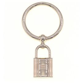 Porte-clés en métal doré Hermès Doré