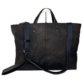 Borsa da viaggio vintage in denim / pelle Yves Saint Laurent nera e marrone Marrone