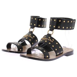 Sandali Dior in pelle nera con borchie dorate Nero