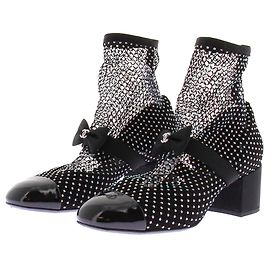 Chanel Botines de tacón de malla Negro