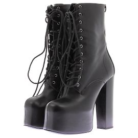 Saint Laurent Botines de tacón de cuero Negro