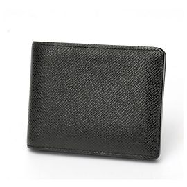 Billetera bi-fold de cuero Taiga Louis Vuitton Negro