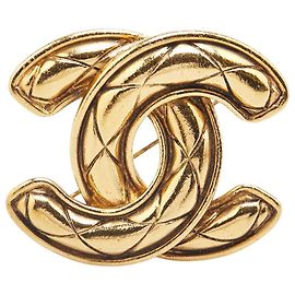 Spilla Coco Mark Matelassé di Chanel D'oro
