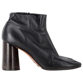 Céline Bottines à talons carrés zippées Celine en cuir noir Noir