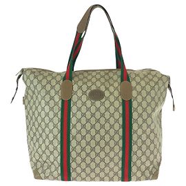 Bolsa Boston em lona GG Supreme de couro Gucci Marrom