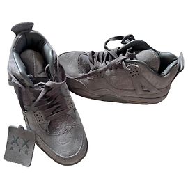 Autre Marque Baskets Air Jordan 4 Retro KAWS Gris