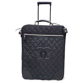 Mala Chanel de nylon acolchoado preto com 2 rodas CC Preto