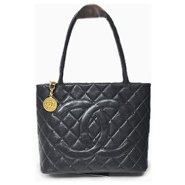 Chanel Caviar Leather Medallion Handbag Black