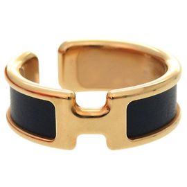 Boucle d'oreille en cuir bleu marine Hermès Olympe GM Doré Bleu Marine