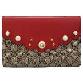 Gucci Supreme Perlen-Clutch Rot