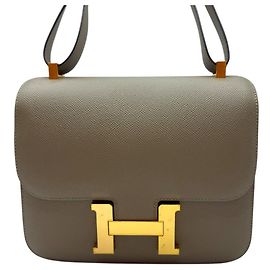 Hermès Bolsa de flap Constance Epsom em ouro Marrom