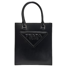 Prada Bolsa transversal mini de couro com logo triangular preto Preto