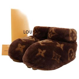 Louis Vuitton Botas Footprint LV Marrom
