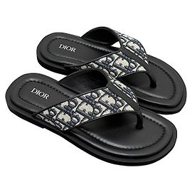 Dior Sandálias slide oblíquas em jacquard bege e preto Marrom