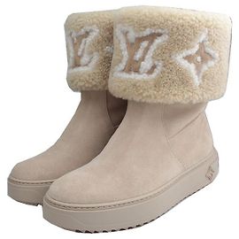 Louis Vuitton Botas de lana camel LV Castaño