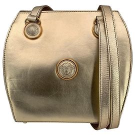 Gianni Versace Bolsa de ombro vintage em couro dourado com alças duplas longas Dourado
