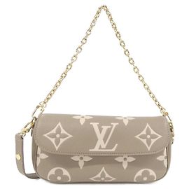 Louis Vuitton Monogram Empreinte Wallet on Chain Ivy M82211 Grau