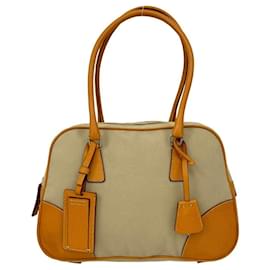 Bolsa tote de lona e couro com logo triangular Prada Bege