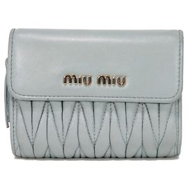 Billetera compacta con cremallera Matelassé Miu Miu Azul