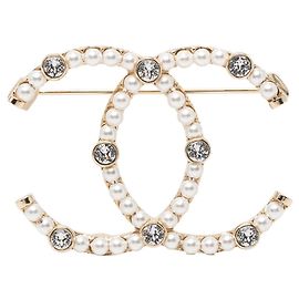 Spilla Coco Mark di Chanel D'oro