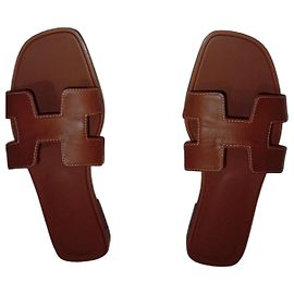 Hermès Mules Ostrich Leather Brown Brown