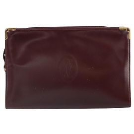 Bolso clutch Must de Cartier de cuero Burdeos