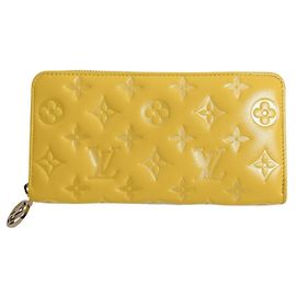 Cartera Zippy Monogram Empreinte Louis Vuitton Amarillo