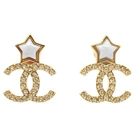 Brincos de estrela dourados e brancos Chanel Branco Dourado