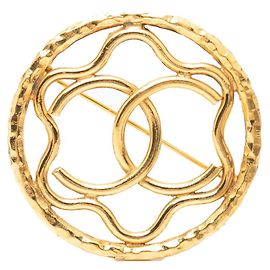 Broche Chanel Coco Mark en Plaqué Or Doré