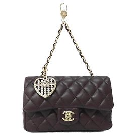 Charm per borsa Chanel in marrone e oro Marrone D'oro