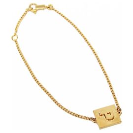 Céline Pulseira de metal com resina e cristais Celine Triomphe Vintage Logo Charms Dourada Dourado