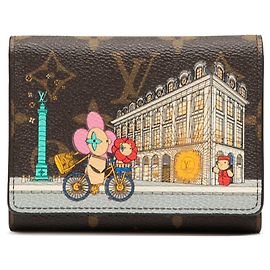 Cartera Victorine Louis Vuitton Monogram Vivienne marrón en París Castaño