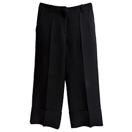 Calças de lã preta com bainha plissada da Valentino Garavani Preto