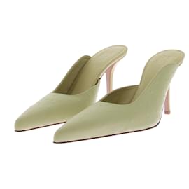Autre Marque Grüne Leder-Mules mit Absatz Grün