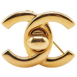 Spilla Turnlock Coco Mark di Chanel D'oro